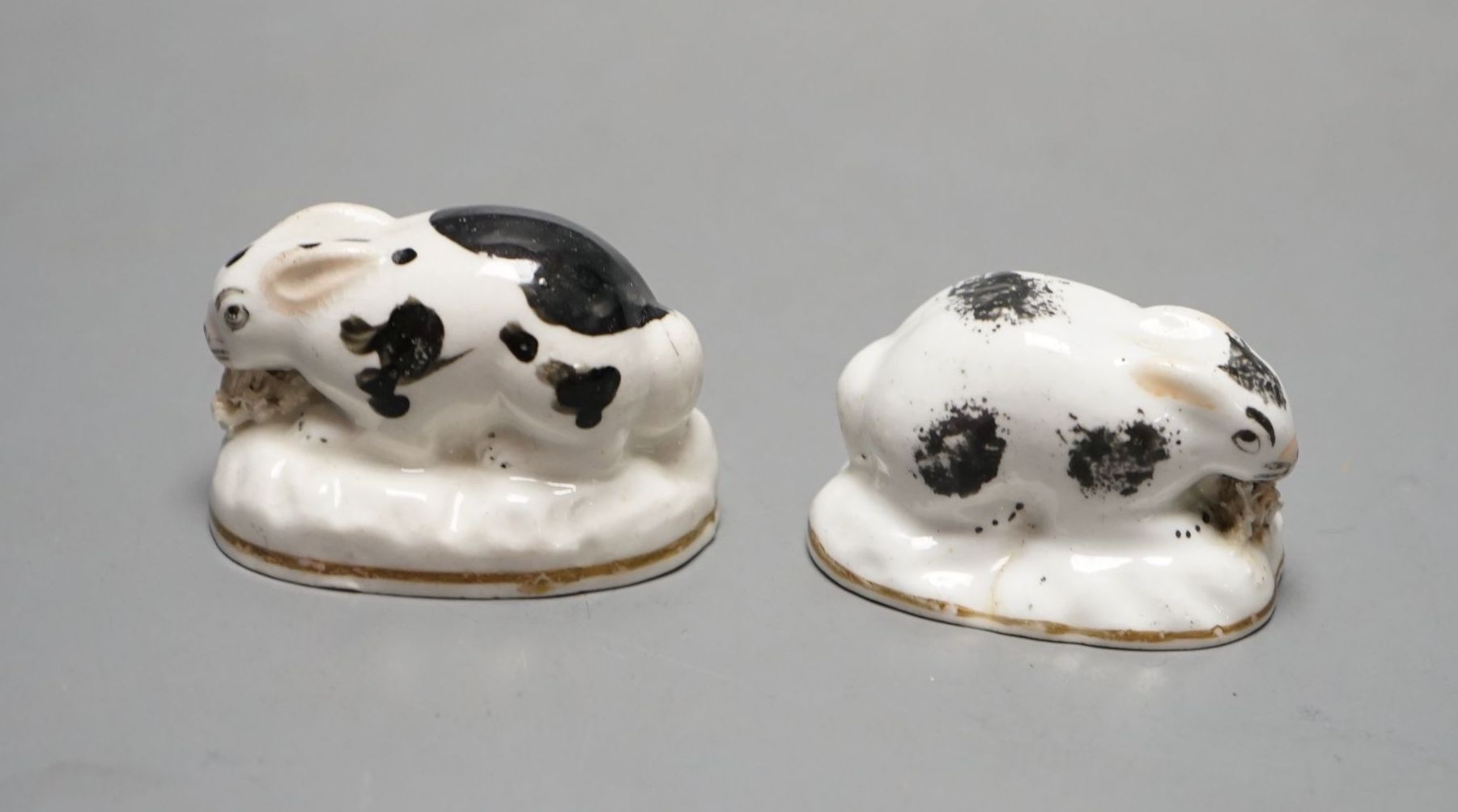 Two Staffordshire porcelain toy models of rabbits, c.1830–50, Provenance: Dennis G. Rice collection, 5 cms wide.